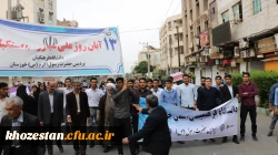 حضور پر شور سرپرست مدیریت امور پردیس های استان ،اساتید،کارکنان و دانشجو معلمان پردیس ها و مرکز دانشگاه فرهنگیان استان خوزستان در راهپیمایی 13 آبان 98